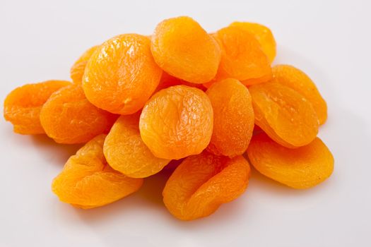 food series: dried apricots one the white background