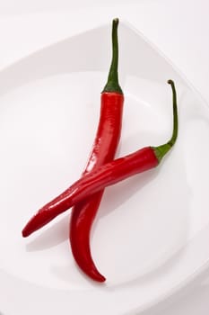 food series: some red peppers on the white background