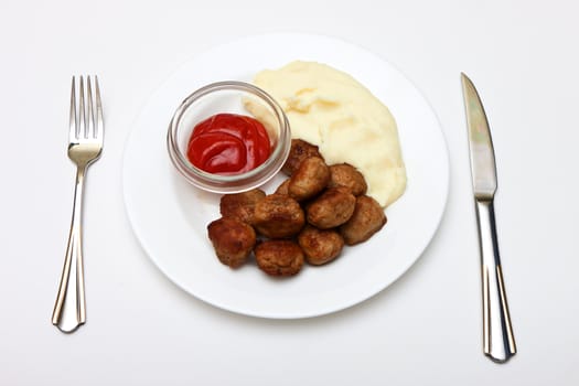 photo of plate with meatballs on white background