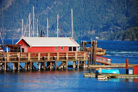 Wooden boathouse on pier