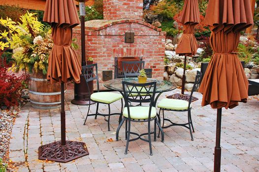 Empty patio with tables and chairs