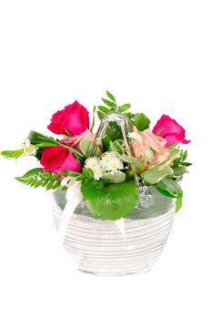 Bunch of roses in a vase isolated on white background