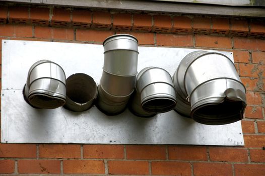 Pipes of ventilation are directed to different sides