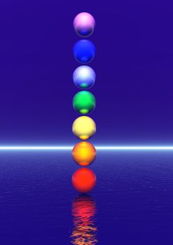 Colored balls for a chakra column in blue background
