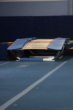 Close up of a mini trampoline in a gym.