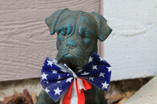 Close up of a Boxer Dog Statue.