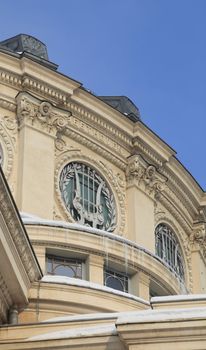 Architectural detail during the winter of the Romanian Athenaeum from Bucharest.Under the roof is the name of Beethoven. 