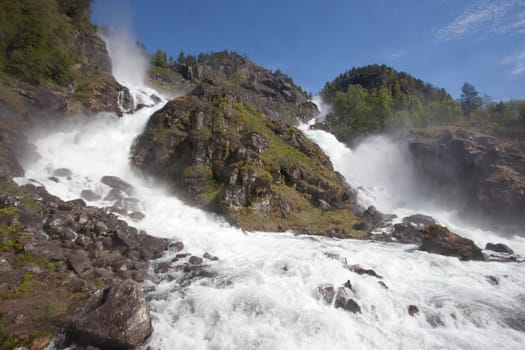 Låtefossen waterfall is a famous waterfall in Hardanger, Norway.