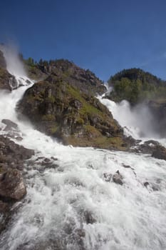 Låtefossen waterfall is a famous waterfall in Hardanger, Norway.