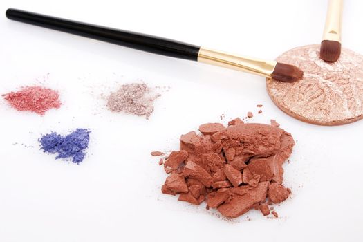 brown,red, blue powder for makeup and two brush