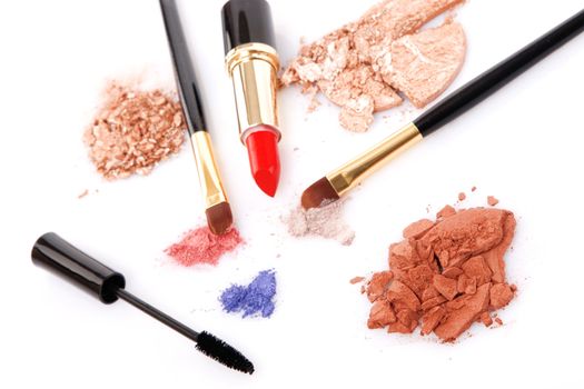 Make-up brush, lipstick and different powder isolated on white background