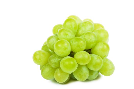 A bunch of green grapes over white background