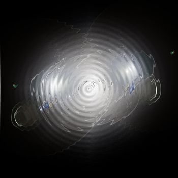 chrome spiral on shiny metal background surface