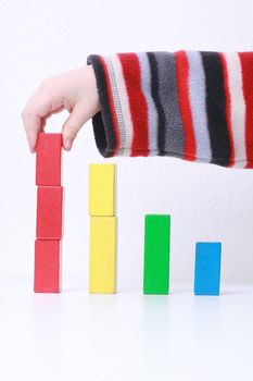 sales charts symbolized by wood toys............