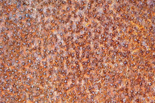 Photographic background - the surface of rusty iron sheet