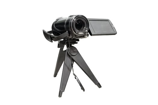 Portable video camera on a tripod. Isolated on white background.