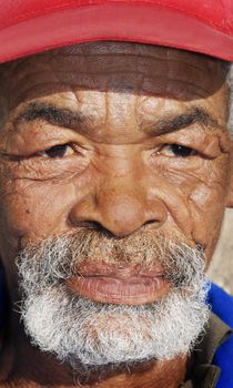 Old African black man with characterful face