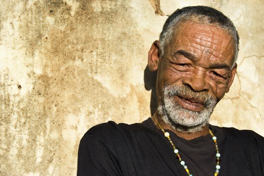 Old African black man with characterful face