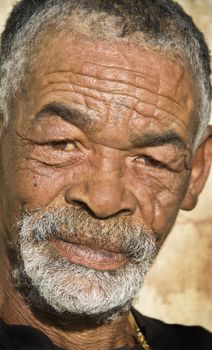 Old African black man with characterful face