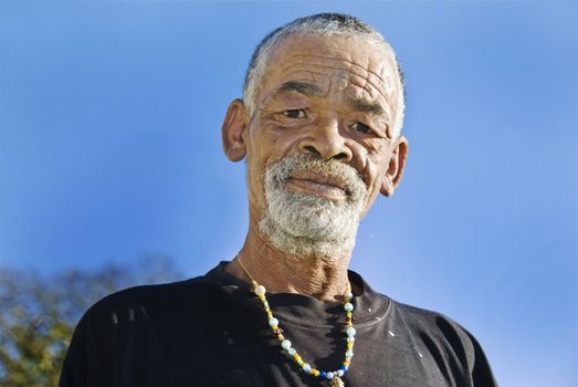 Old African black man with characterful face