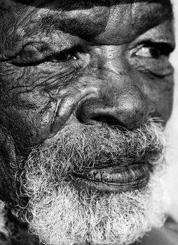 Old African black man with characterful face