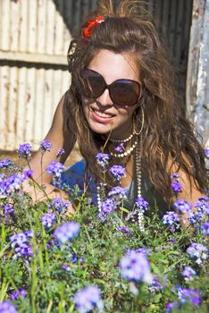 Beautiful woman having a silent moment in the field