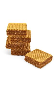 Wafer with a layer of caramelized condensed milk, laid out a wafer and stacked separately isolated on a white background
