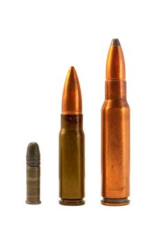 Two cartridges for the automatic weapons and one for small-bore rifle isolated on a white background