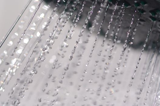 water drops falling from a shower indoors