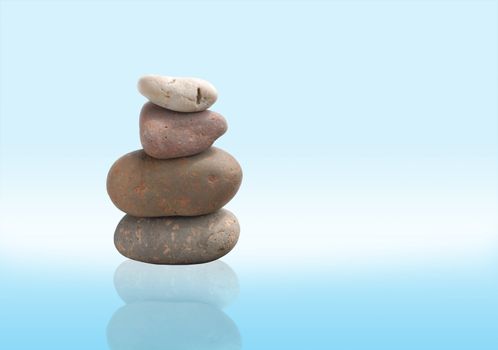 A balance group of stones in zen water background.