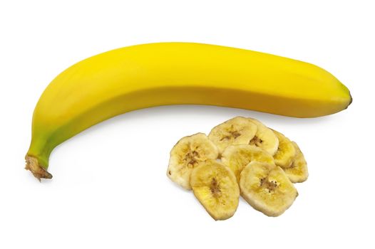 Yellow banana with a bunch of dried slices of banana isolated on a white background