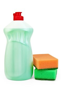 Green bottle with detergent and two sponges isolated on white background