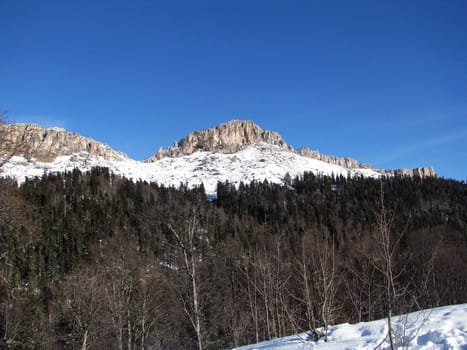 The main Caucasian ridge; rocks; a relief; a landscape; a hill; a panorama; high mountains; peaks; caucasus; top; a slope