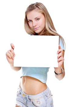 beautiful woman shows blank piece of paper on a white background isolated