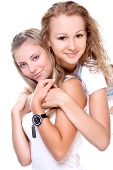 two beautiful women in a white T-shirts on a white background isolated