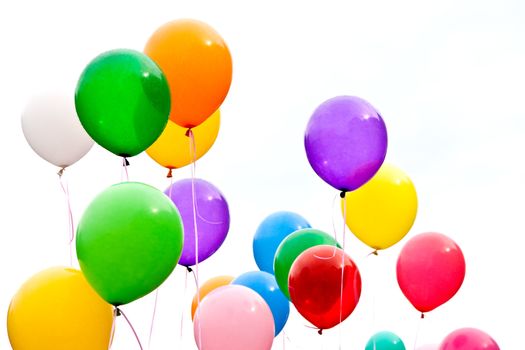 party balloons are a group in the sky as a background