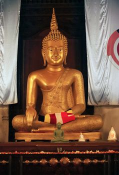 Statue  Buddha in very important Buddhist shrine - Temple of the Tooth. Sri Lanka