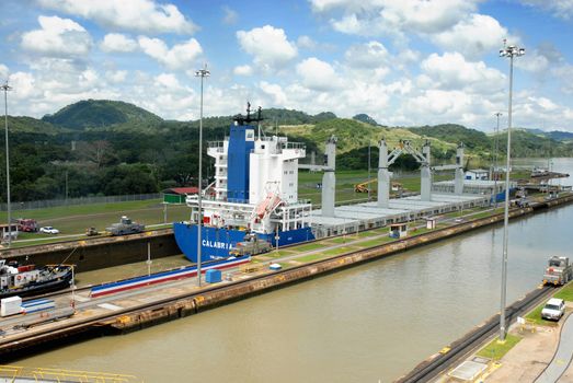 PANAMA-SEPTEMBER 10. Cargo ship crosses locks on September 10, 2006 in Panama Canal. Located at the narrowest point between the Atlantic and Pacific oceans, the Panama Canal has had a far-reaching effect on world economic development.