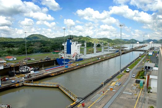 PANAMA-SEPTEMBER 10. Cargo ship crosses locks on September 10, 2006 in Panama Canal. Located at the narrowest point between the Atlantic and Pacific oceans, the Panama Canal has had a far-reaching effect on world economic development.