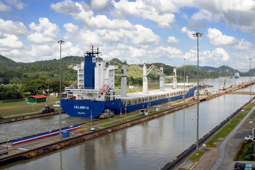 PANAMA-SEPTEMBER 10. Cargo ship crosses locks on September 10, 2006 in Panama Canal. With its unique location at the narrowest point between the Atlantic and Pacific oceans, has had a far-reaching effect on world economic development.