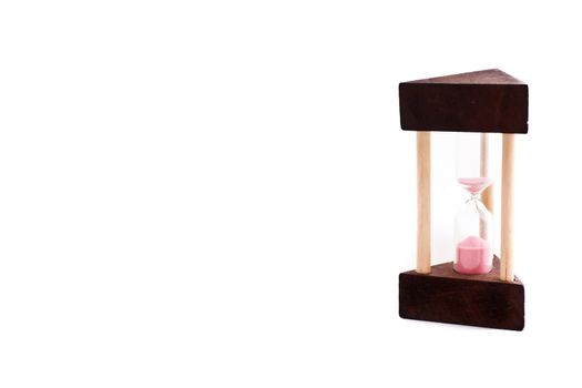 Hourglass with copyspace. Structure made of wood.