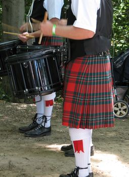 Image shows a young drummer's quick hands while competing for honours.
