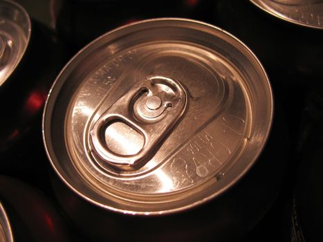 An isolated beverage can top - close up.