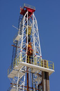 Oil pump estractor isolated on blue sky