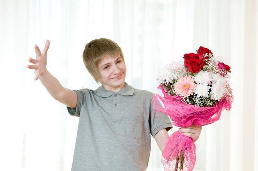 good-natured young man with a bouquet of flowers