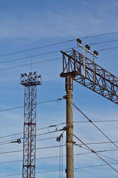 Electric pole on the rail and Metal Tower