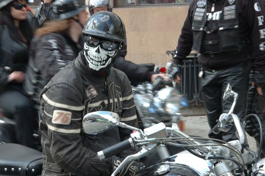 WROCLAW, POLAND - April 16: Motorcycle parade and season opening in Poland. Riders gather to enjoy new season and collect blood for children in hospitals on. Unknown rider in mask April 16, 2011.