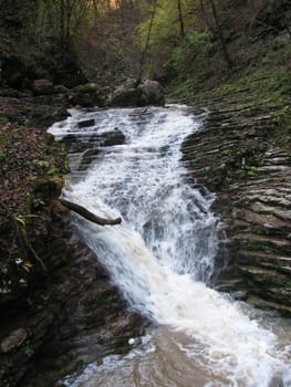 Falls; mountains; caucasus; the river; a stream; splashes; a moisture; a stream; water; rocks; a relief; the nature