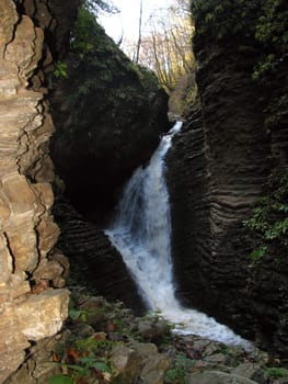 Falls; mountains; caucasus; the river; a stream; splashes; a moisture; a stream; water; rocks; a relief; the nature