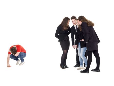 Young man rejected from the group isolated on white background